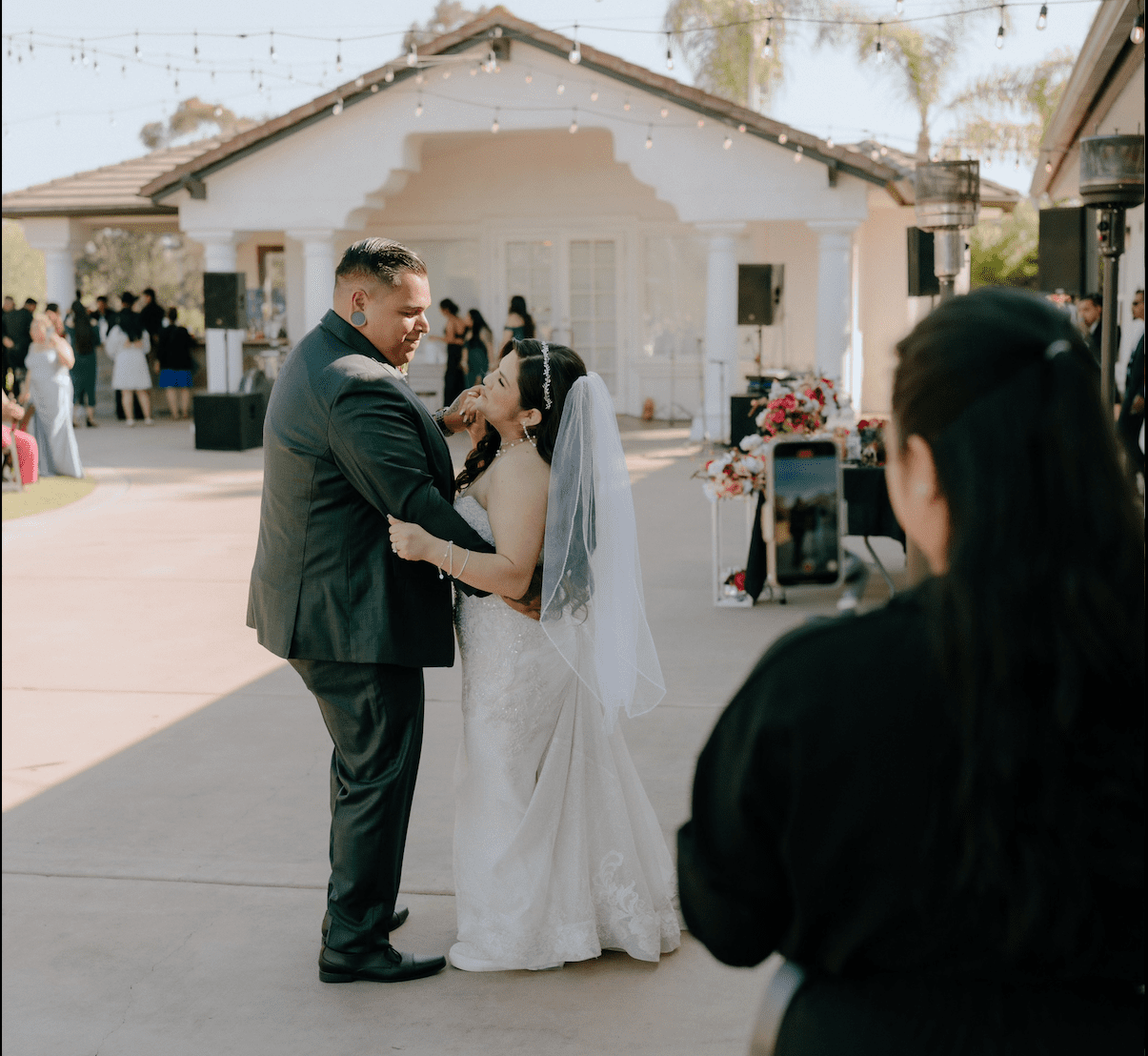 wedding content creator capturing Bride and groom first dance moment in a hacienda setting